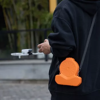 SUNNYLIFE tvrda torba za nošenje za dron DJI Flip s remenom - narančasta / FP-SN953-C